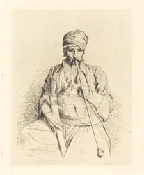 Arabe assis avec une pipe