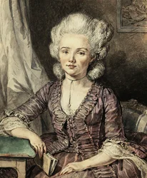 Une jeune femme assise à une table avec un livre, 1785