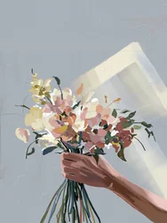 Une main tenant des fleurs au pastel