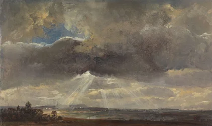 Nuages et rayons de soleil sur le Windberg près de Dresde
