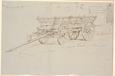 Un chariot de récolte avec une poule caquetante sur la barre du chariot