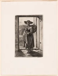 La femme hongroise qui se tient à la porte