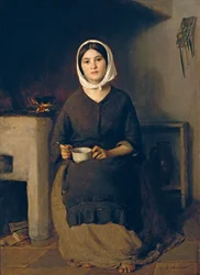 Femme assise dans une cuisine paysanne