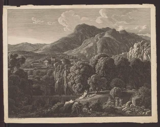 Un paysage de montagne avec, au fond, une ville à l