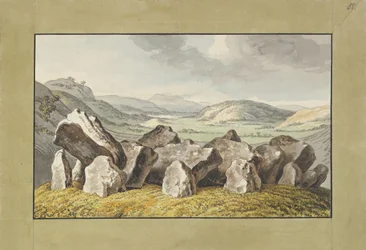 Un cercle de pierres préhistoriques sur un monticule, un paysage étendu au-delà