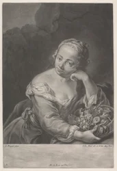 Femme avec un panier de fruits