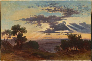 Soleil perçant les nuages au-dessus de la campagne romaine