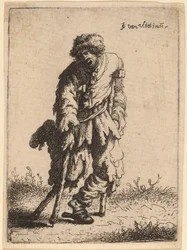Mendiant avec une jambe de bois