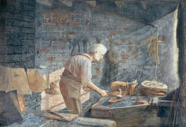 Un forgeron travaillant à sa forge