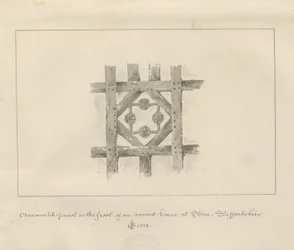 Pierre - Panneau ornemental sur une maison ancienne : dessin au lavis sépia