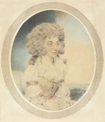 Jeune femme assise de profil à droite