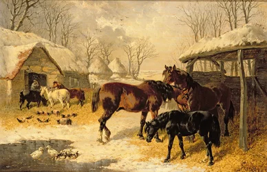 Une cour de ferme en hiver