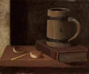 Tasse, livre, biscuits et allumette
