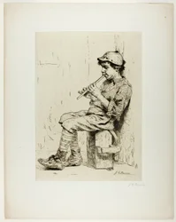 Garçon jouant de la flûte