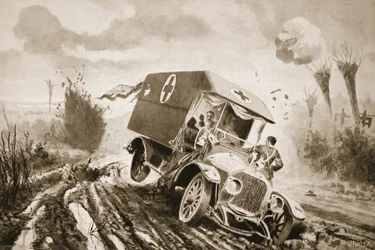 Le soldat Adams allant au secours des blessés dans une ambulance motorisée qui avait heurté un trou d