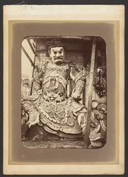 [Statue de personnage chinois]