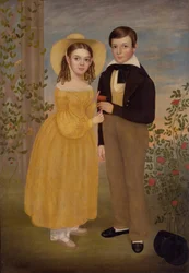 Un garçon et une fille dans un jardin