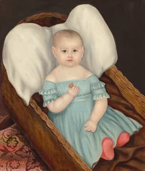 Bébé dans un panier en osier