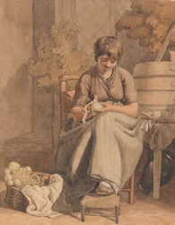 Une fille épluchant des légumes