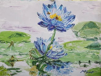 Des abeilles sur un lotus bleu