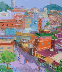 Une ville animée à flanc de colline