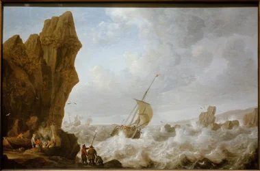 Bateau de pêche en mer agitée devant une côte rocheuse