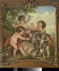 Trois enfants jouant avec un bouc