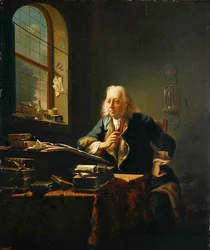 Un érudit assis à son bureau