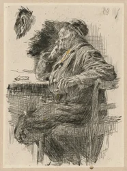 Homme assis à table