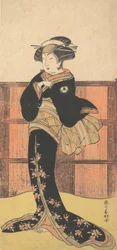 Le quatrième Iwai Hanshiro en femme dans un kimono noir, vers 1778