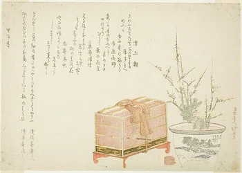 Cage à oiseaux et prunier en pot