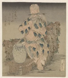 Homme en robe de feuilles