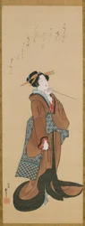 Femme tenant une pipe à tabac