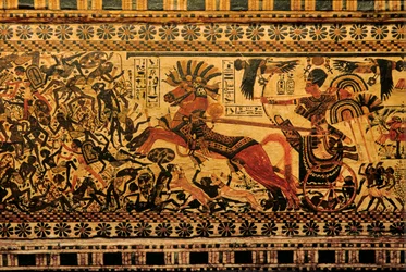 Boîte peinte représentant Toutankhamon en guerrier sur un char poursuivant des Nubiens, 2007