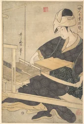 Une femme tissant, assise à un métier à tisser manuel