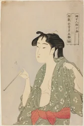 Femme exhalant de la fumée d