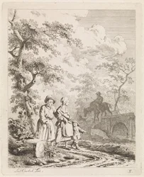 Vieil homme, femme et enfant sur un chemin forestier