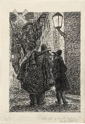 Deux hommes dans la rue dans le noir