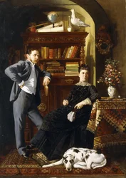 Un couple dans un intérieur avec un chien