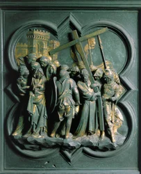 Porte Nord (appelée Porte de la Croix, au Nord), détail extérieur : « La Montée au Calvaire » sculpture en bronze réalisée par Lorenzo Ghiberti