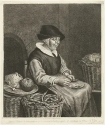 Vieille femme écosse des haricots