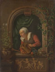 Femme arrosant une plante