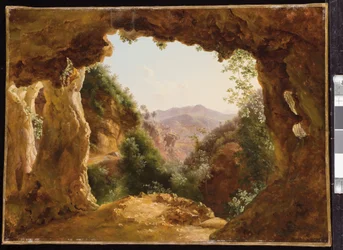 Une grotte dans un paysage rocheux