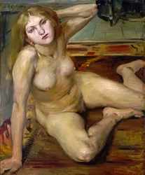 Fille nue sur un tapis