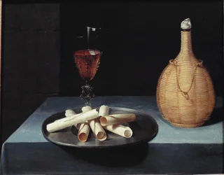 Nature morte avec dessert de gaufrettes, bouteille de vin et verre