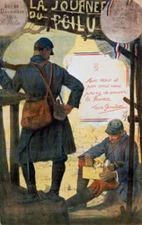 Deux soldats français parcourant des colis de soins envoyés de chez eux.