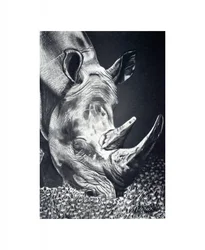 Le puissant broutage du rhinocéros