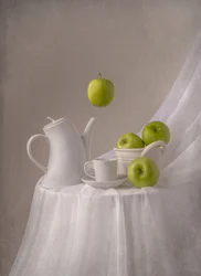 Des pommes vertes flottantes