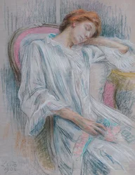 Une jeune femme endormie dans un fauteuil