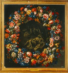 Couronne de fleurs avec, au centre, une scène biblique